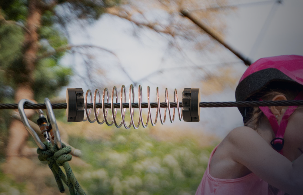 barrel spring on zipline for barrel spring braking system for stopping safely