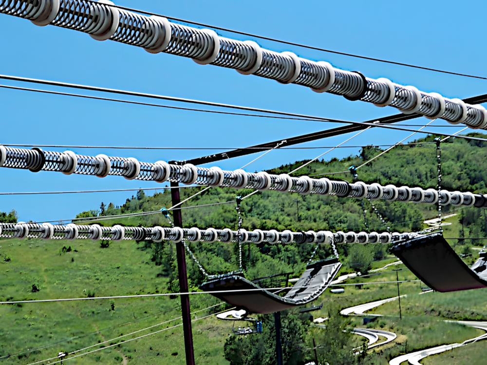 barrel spring braking system on parallel ziplines zipline course